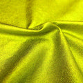 A sample of sleek foiled stretch twill in the color lime.