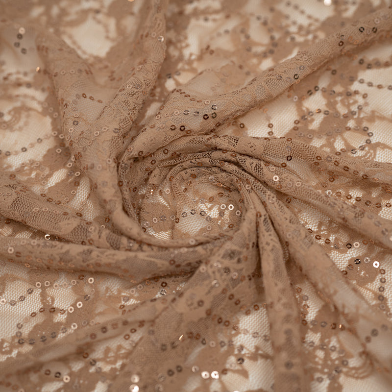 A swirled sample of Sophia Stretch Lace Sequin in Skin.