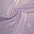 A swirled sample of sparkly foiled spandex in the color viola purple.