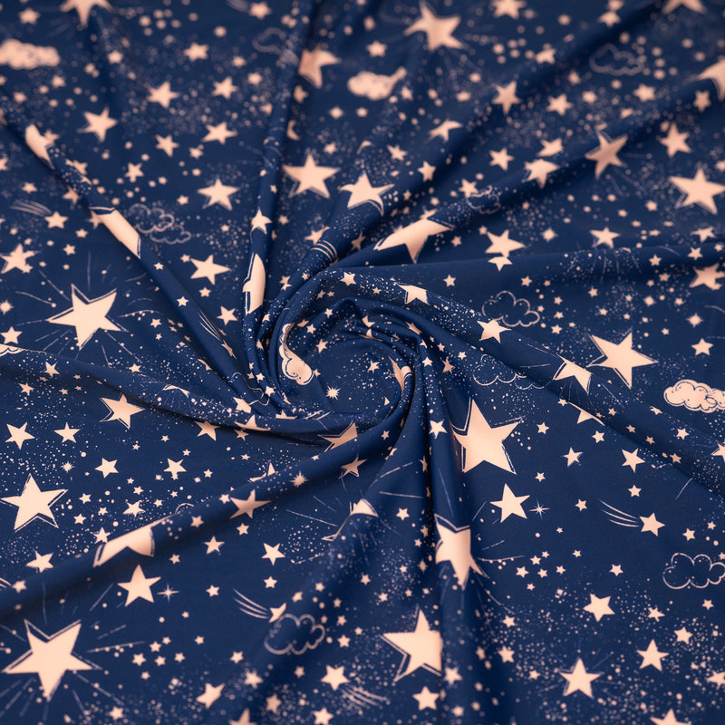 Swirled piece of Star Bright Printed Spandex fabric.