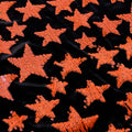 A flat sample of Starlight Stretch Velvet Flip Sequin in the color Black-Orange