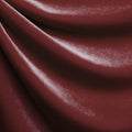 A drapped piece of Supreme Stretch Velvet in the color burgundy.