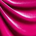 A drapped piece of Supreme Stretch Velvet in the color fuchsia.