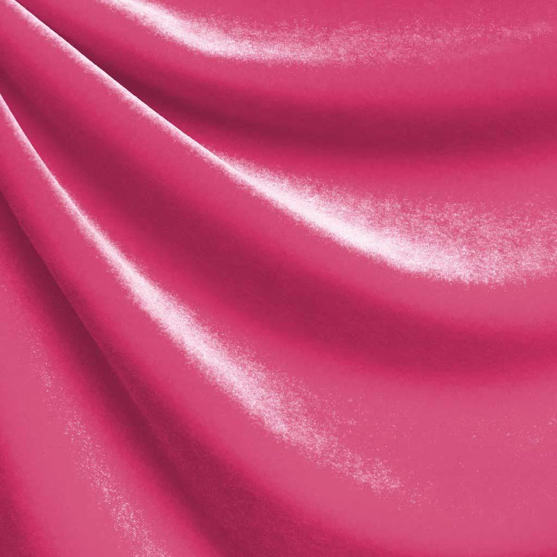 A drapped piece of Supreme Stretch Velvet in the color neon pink.
