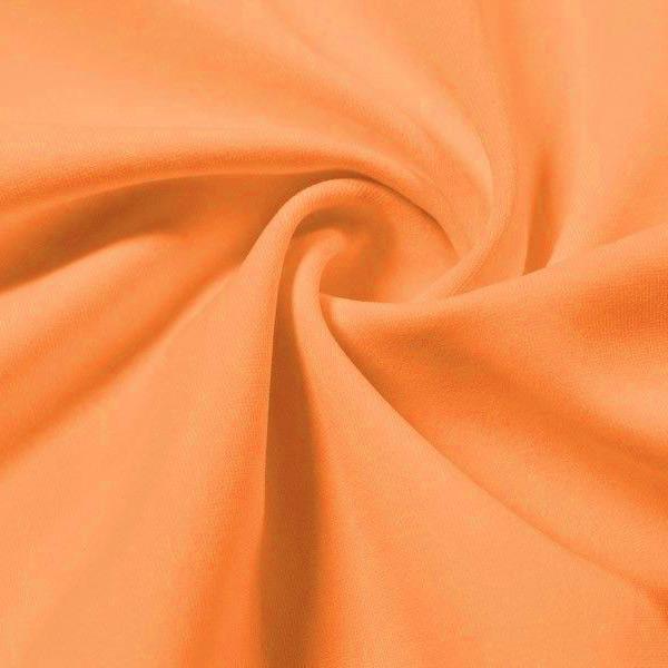 A swirled piece of Synergy Polyester Lycra in the color dreamsicle pie.