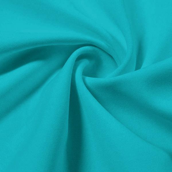 A swirled piece of Synergy Polyester Lycra in the color macaw feather.