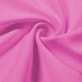 A swirled piece of Synergy Polyester Lycra in the color pink cockatoo.