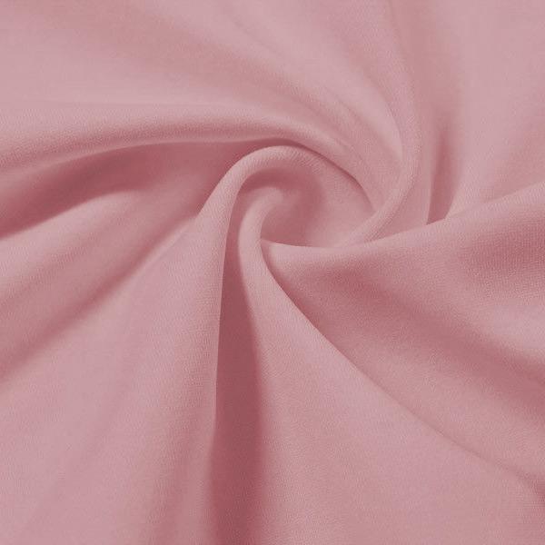 A swirled piece of Synergy Polyester Lycra in the color shabby chic.