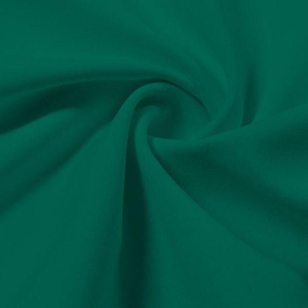 A swirled piece of Synergy Polyester Lycra in the color spruce.