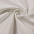 A swirled piece of Synergy Polyester Lycra in the color white.