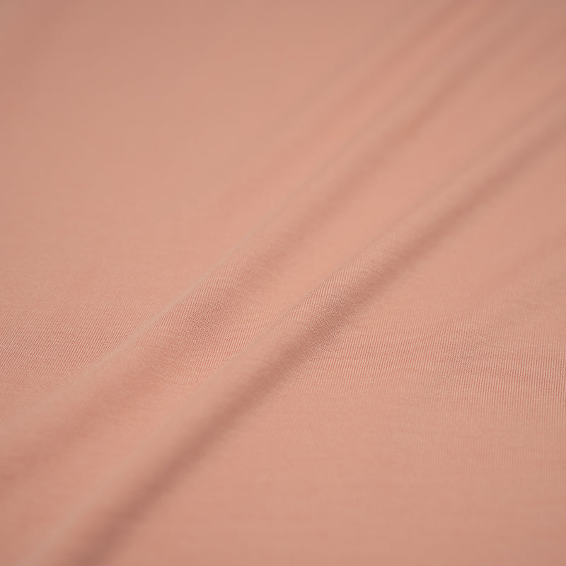 A sample of Tranquility Modal Spandex in the color Rosy-Peach