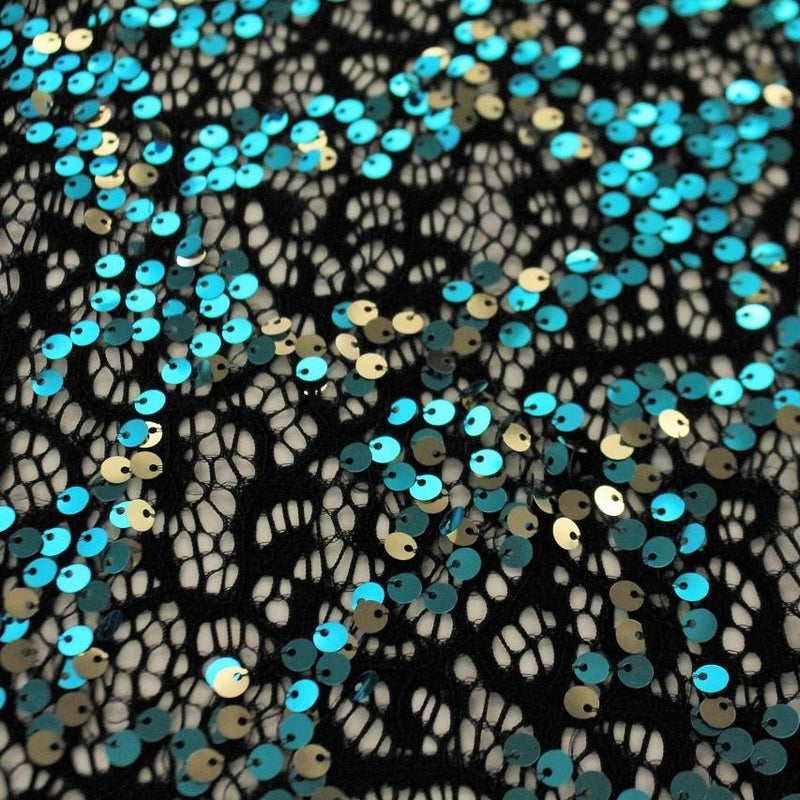 A flat sample of Tango Stretch Lace Sequin in the color Black-Turquoise-Gold