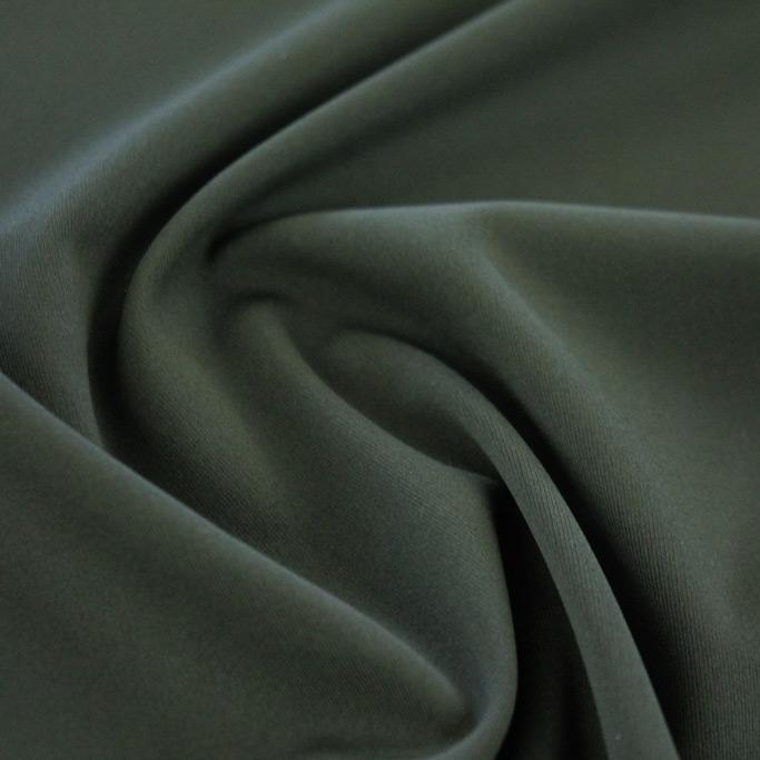 A swirled sample of TechFlex Micro Poly Spandex in color Olive