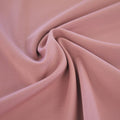A swirled sample of TechFlex Micro Poly Spandex in color Rose.
