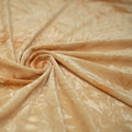 A piece of Tempest Tie Dye on Revival Crushed Stretch Velvet Fabric in color Sand.