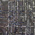 A flat sample of Thin Plaid Stretch Mesh Sequin in the color Black-Charcoal-Silver at blue moon fabrics.