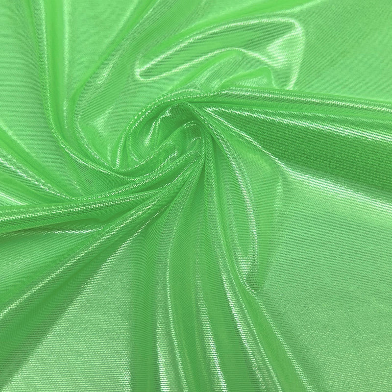 A swirled sample of ultrasheen foiled power mesh with a lime and lt. gold foil available at Blue Moon Fabrics.