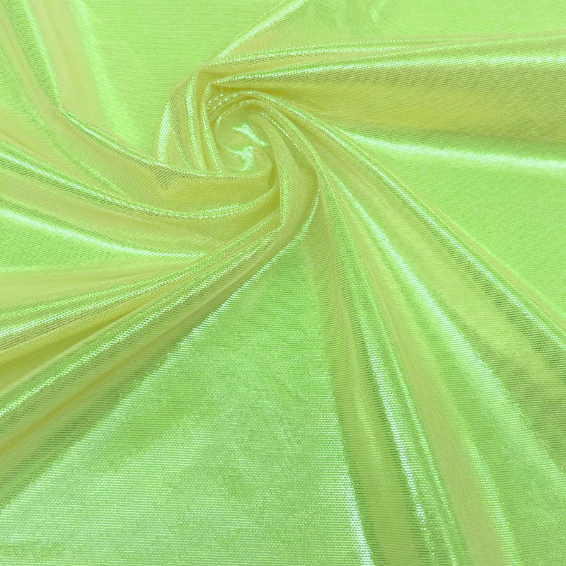 A swirled sample of ultrasheen foiled power mesh with a neon yellow and lt. gold foil available at Blue Moon Fabrics.