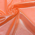 A swirled sample of ultrasheen foiled power mesh with a Tangerine and lt. gold foil available at Blue Moon Fabrics.