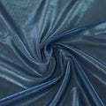 A swirled sample of ultrasheen foiled power mesh with a aquamarine mesh and dim blue foil available at Blue Moon Fabrics.