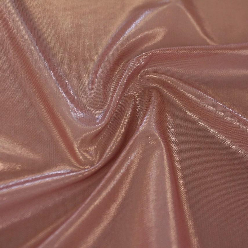 A swirled sample of ultrasheen foiled power mesh with a topaz mesh and light copper foil available at Blue Moon Fabrics.