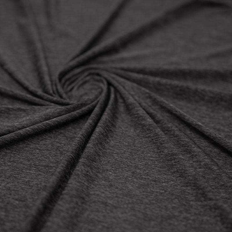 Shot of swirled UniFlex Nylon Polyester Spandex Reversible Knit Top Weight Fabric in color black