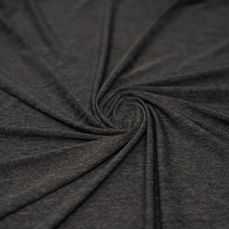 Shot of swirled UniFlex Nylon Polyester Spandex Reversible Knit Top Weight Fabric in color black