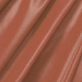 A rippled piece of Viper Wet Look Spandex in the color copper.