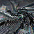 A swirled piece of Vision Holographic Spandex in the color Black-Silver