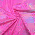 Swirled sample shot of Vision Holographic Spandex in the color Hot Pink/Silver Holo