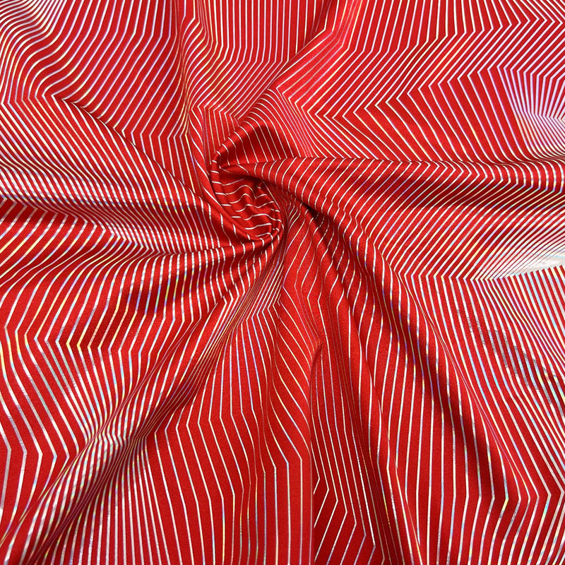 Swirled sample shot of Vision Holographic Spandex in the color Red/Silver Holo
