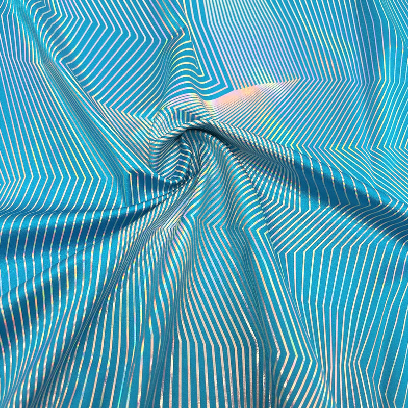 Swirled sample shot of Vision Holographic Spandex in the color Turq/Silver Holo
