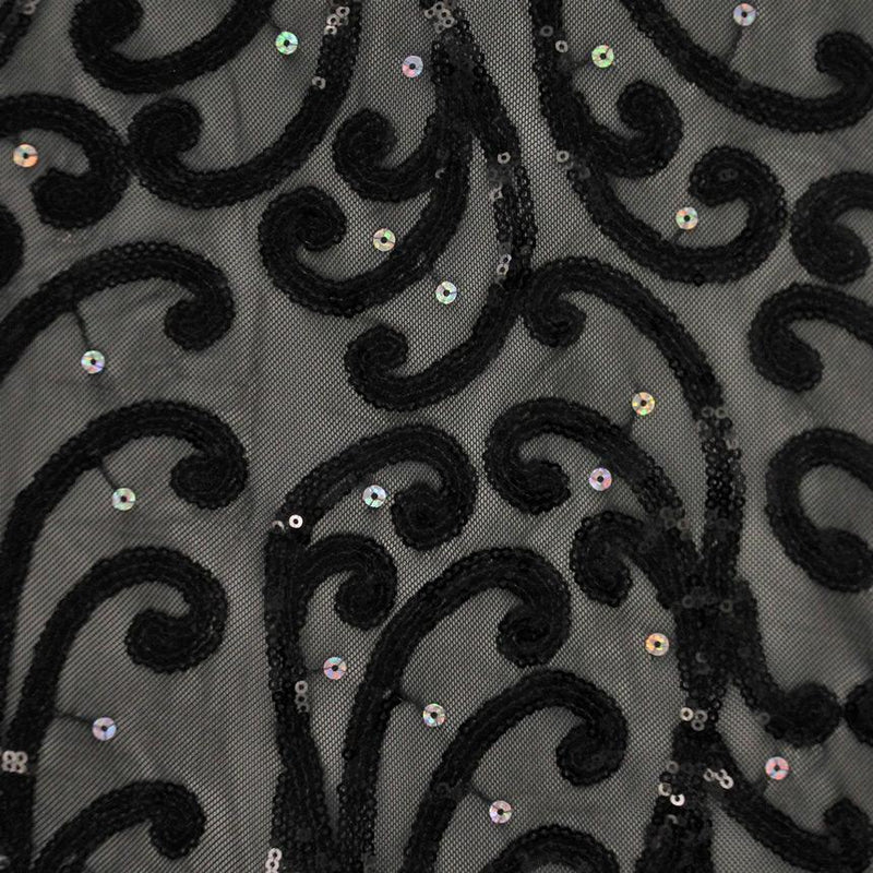 A flat sample of whirling motion stretch mesh sequin in the color black.