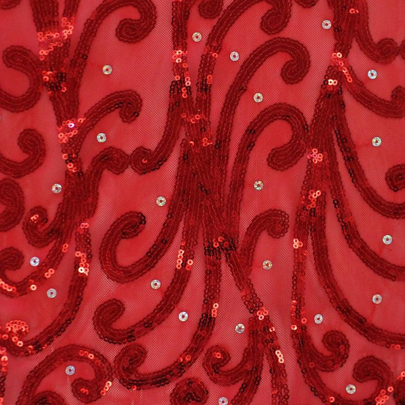 A flat sample of whirling motion stretch mesh sequin in the color red.