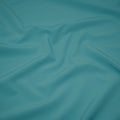 Detailed shot of Wipeout Woven Polyester Spandex in the color Bahama-Mama