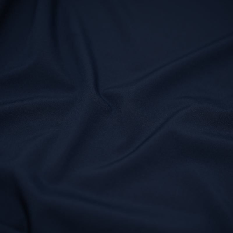 Detailed shot of Wipeout Woven Polyester Spandex in the color navy
