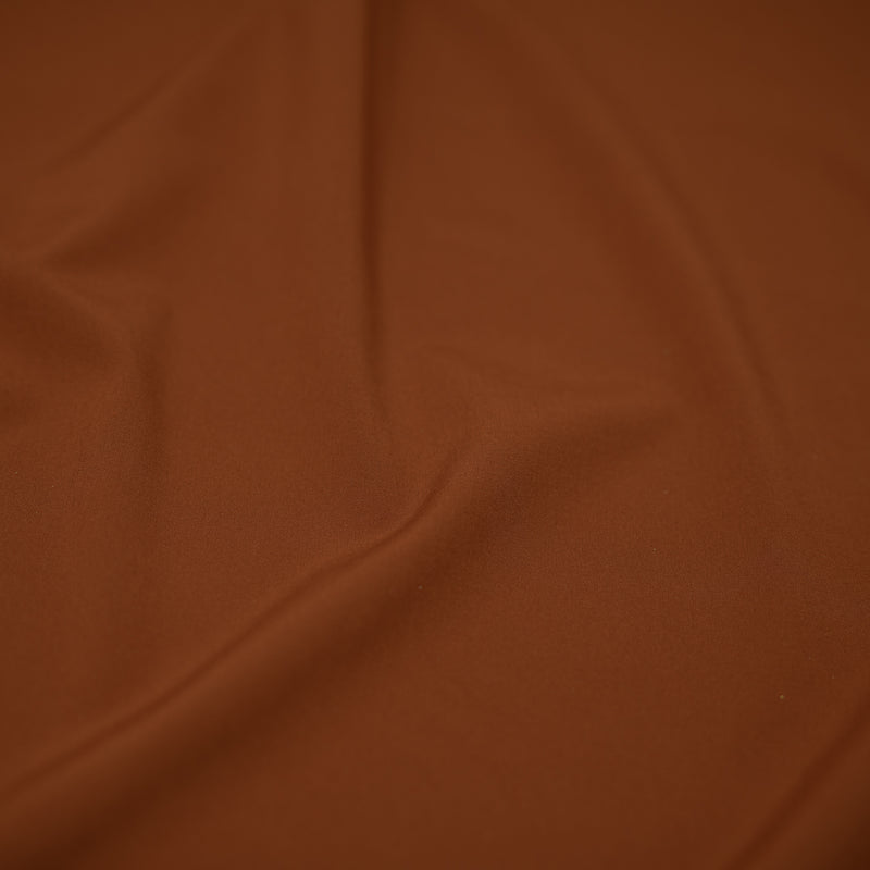 Detailed shot of Wipeout Woven Polyester Spandex in the color Picante