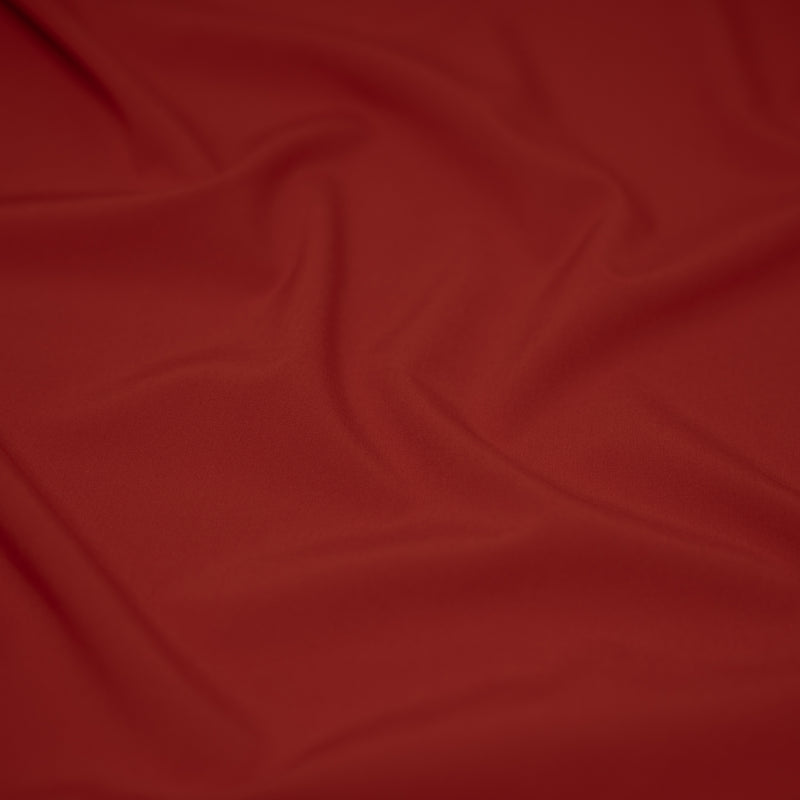 Detailed shot of Wipeout Woven Polyester Spandex in the color red