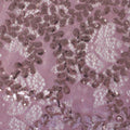 A flat sample of wisteria stretch lace sequin in the color mauve.