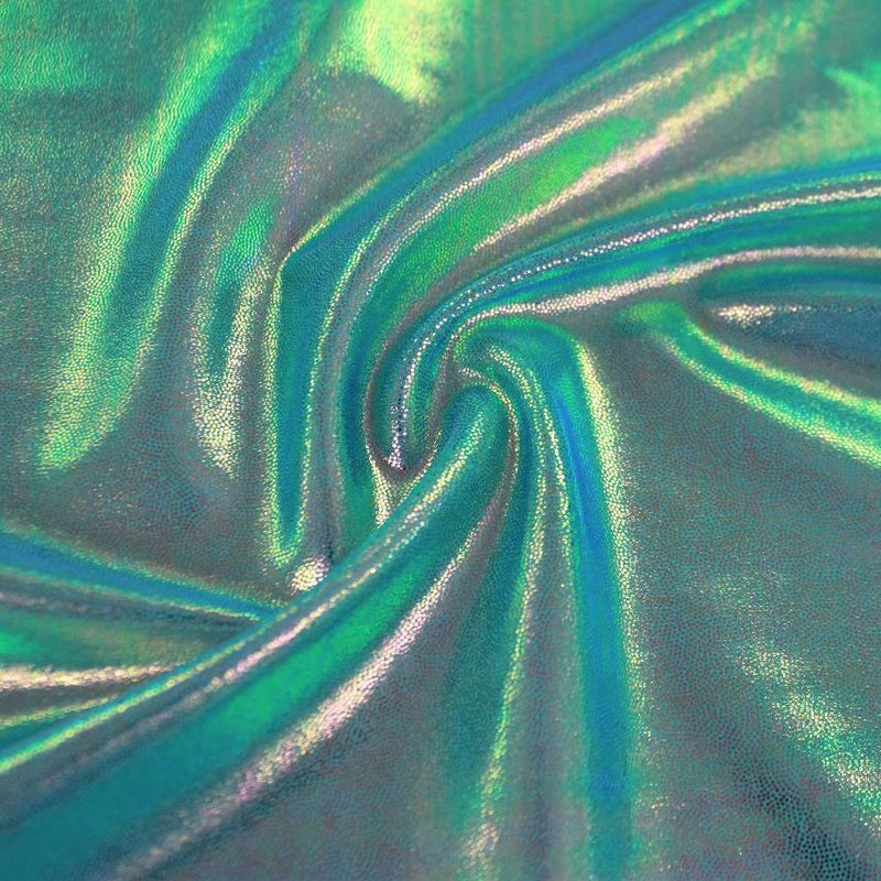 A swirled sample of wizard foiled spandex in the color hawaii pink.