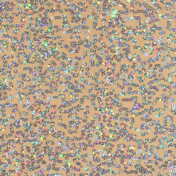 A swirled sample of zsa spa spandex sequin in the color nude-silver.