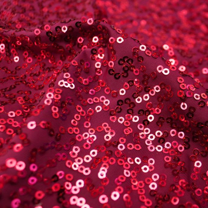 A flat sample of zsa zsa spandex sequin in the color burgundy-wine.