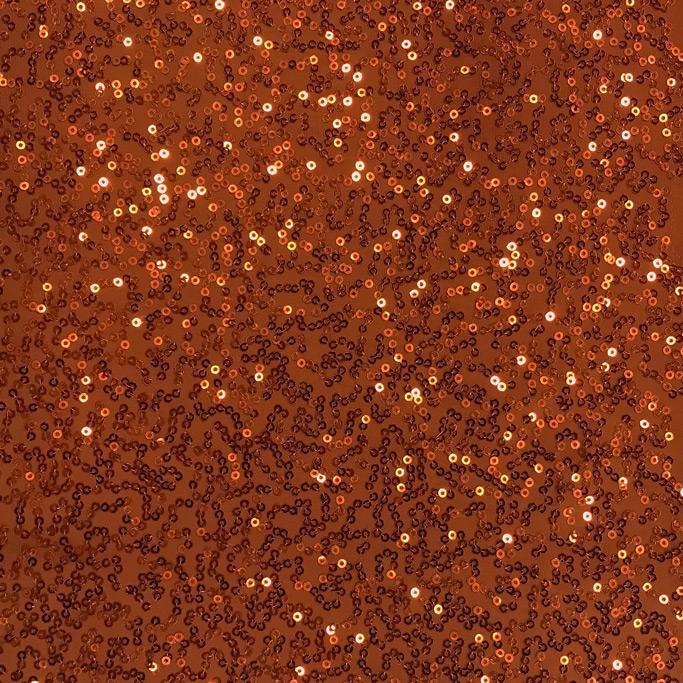 A flat sample of zsa zsa spandex sequin in the color copper.