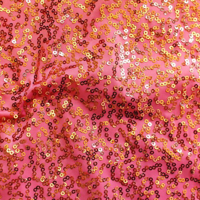 A flat sample of zsa zsa spandex sequin in the color coral-rose gold.