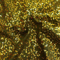 A flat sample of zsa zsa spandex sequin in the color olive-chartruese.