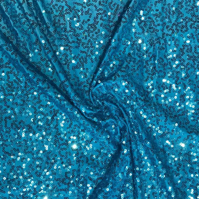 A flat sample of zsa zsa spandex sequin in the color turquoise.