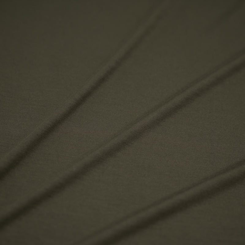 A sample of Bliss Micro Modal Spandex Jersey Fabric in the color Dusty Olive