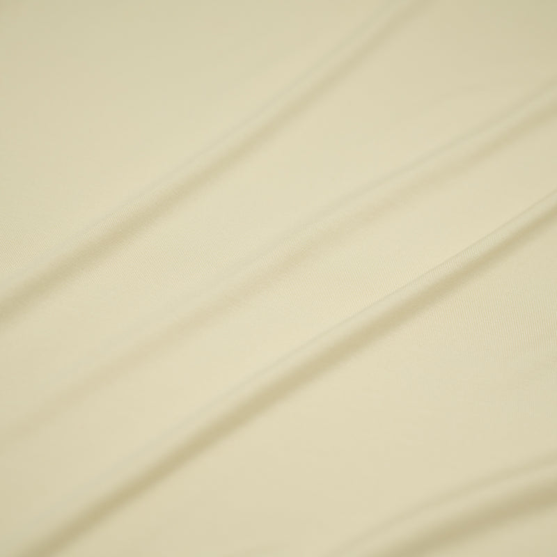 A sample of Bliss Micro Modal Spandex Jersey Fabric in the color Ivory