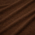 A swirled sample of EcoDelish Double Peached Melange recycled polyester spandex fabric in the color Espresso