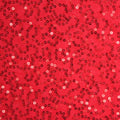 A flat sample of edgy stretch twill sequin in the color red.